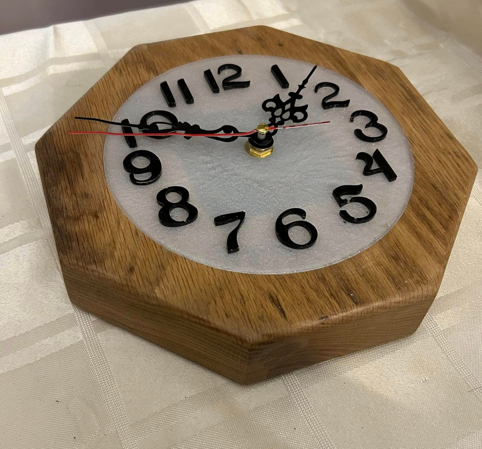 Octagon oak mantle clock with hand-applied numerals